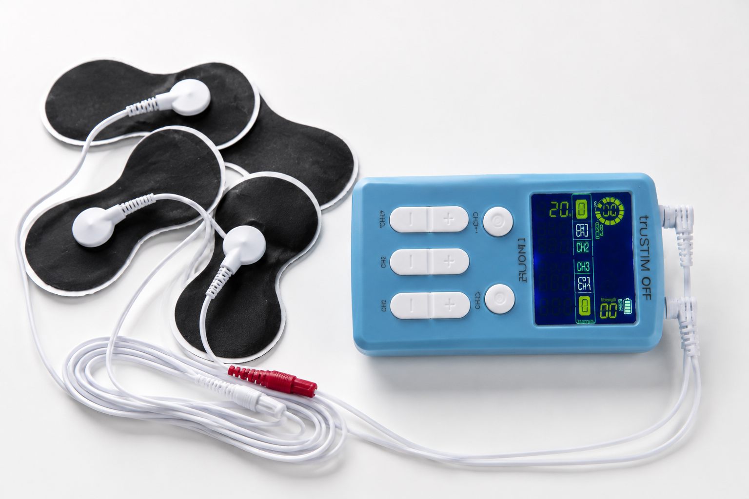 Quad TENS unit used for TMJ muscle pain relief at Smile Gallery Bhopal